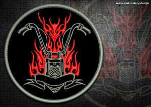 This Biker patch fiery bike design was digitized and embroidered by www.embroidery.design.